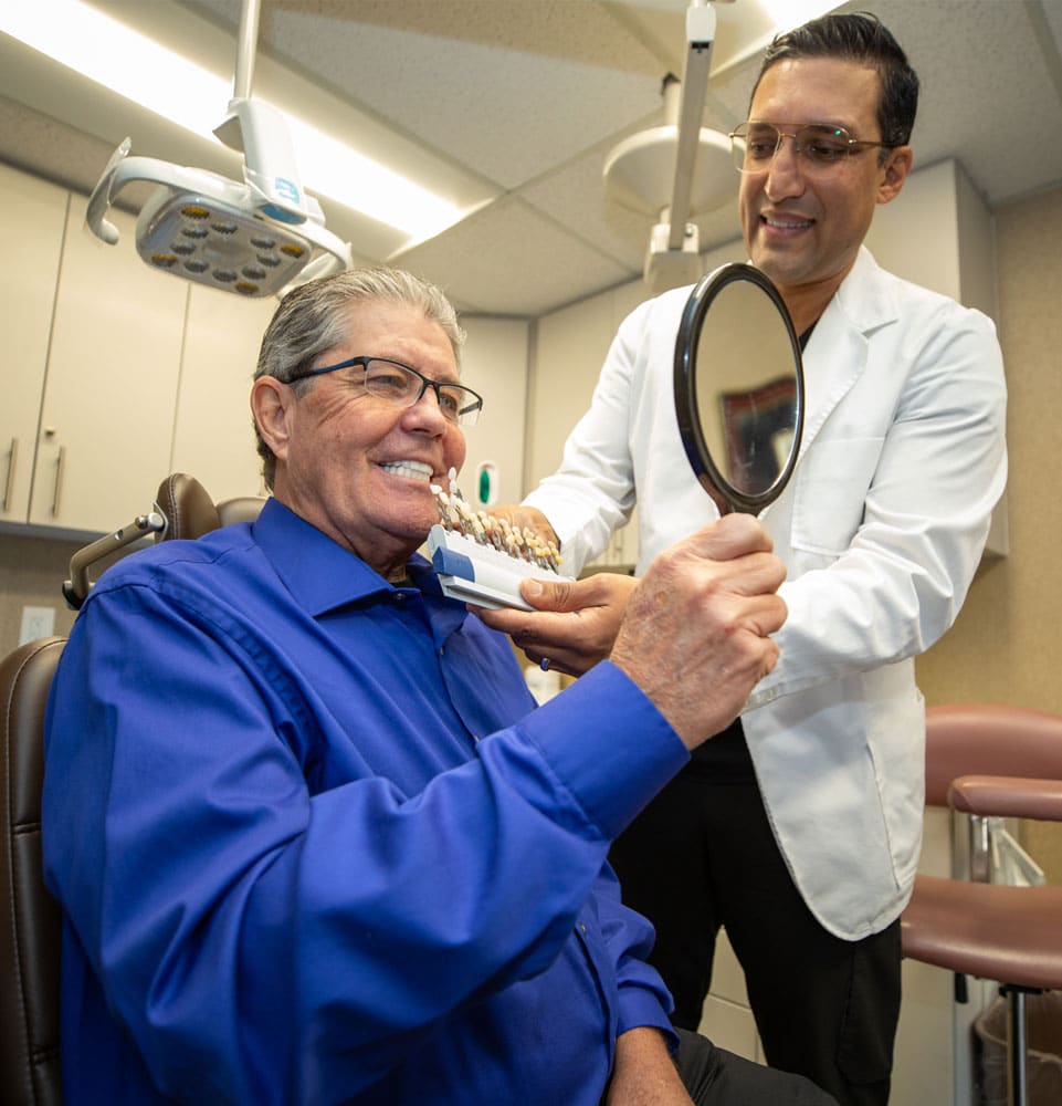 dental implant patient with dr aman trying veneers