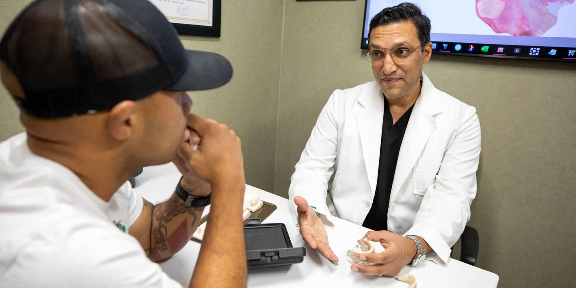dr bhullars expertise shine sthrough as he explains implants