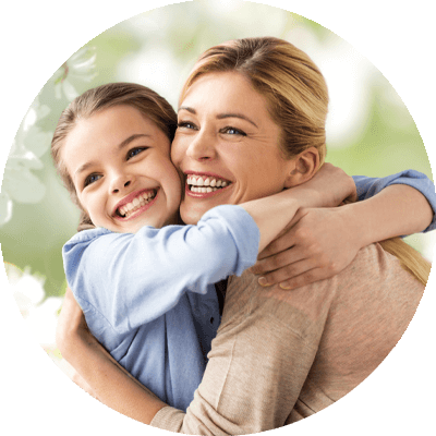 mom and daughter with good oral hygiene after dental visit